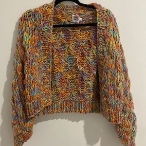 Colorful knit cardigan with puffed sleeves from Princess Polly.